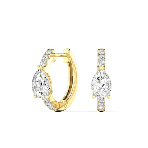 14 Karat Lab Grown Huggy Earrings with a Pear-Shape Center (.70 Total Carat Weight F Color VS Clarity)