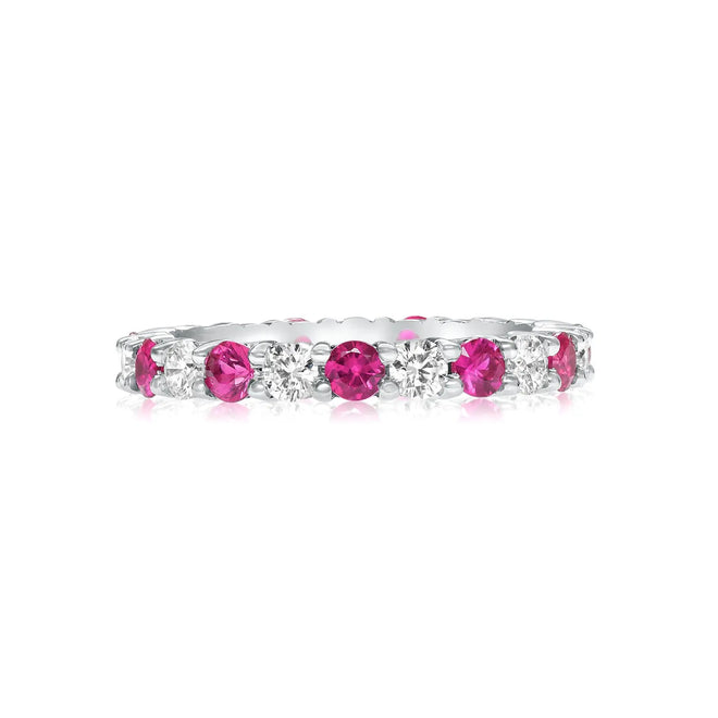 Shared prong diamond and pink sapphire wedding band in 14 karat