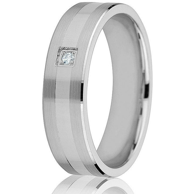 Two satin strip edges with a high polish centre offsets the one diamond in white gold in this 6 m.m. wedding band.