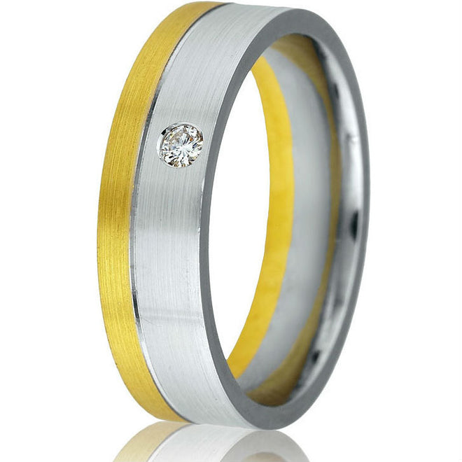 Modern solid two-tone 6 m.m. comfort-fit wedding band in 14k white and yellow gold with one round natural brilliant diamond .05 ct.