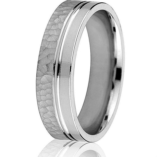 Engraved comfort fit hammered and smooth 6 mm band in white gold.