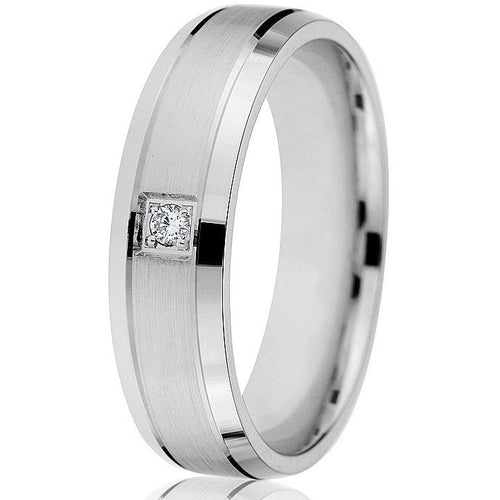 Flat edge with a shiny groove circling the ring with a satin finish centre and one round natural brilliant (0.03) distinguishes this 6mm comfort-fit wedding band.