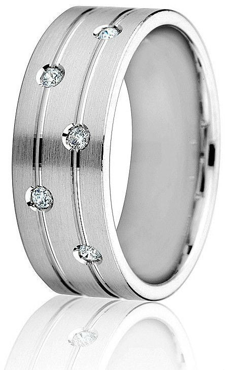Contemporary look in this  8 mm wedding band with 2 bright engraved parallel lines and satin finish top with 5 round natural brilliants( 0.10 cts) in 10k white gold.