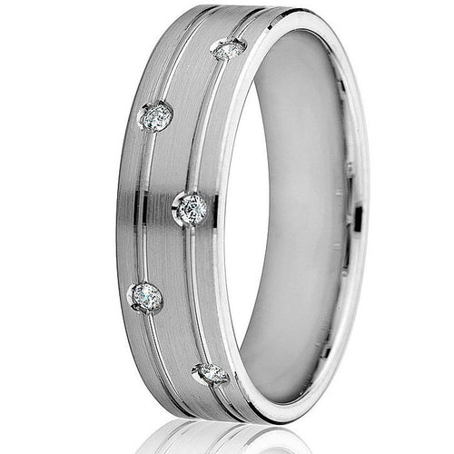 Contemporary look in this 6 mm wedding band with 2 bright engraved lines and satin finish top with 5 flush set round natural brilliants in 14k white gold.
