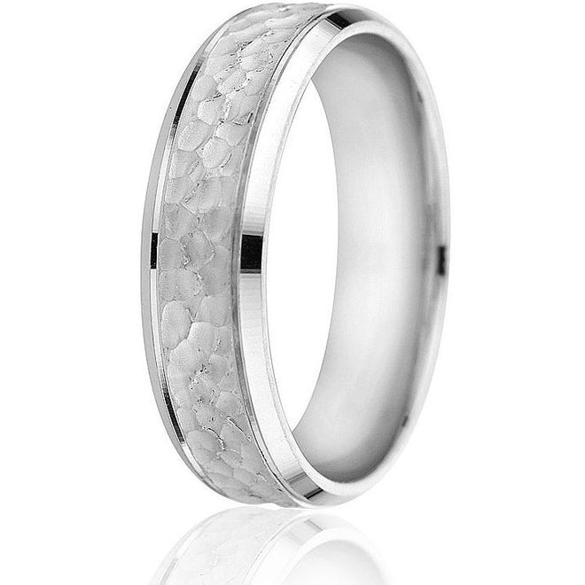 Bright cut edge followed by an engraved line and hammered centre gives this classic style wedding band an updated twist in 14k white gold.