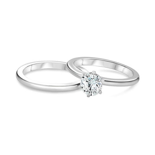 The PNJ classic platinum solitaire diamond ring with a 0.75 carat round natural brilliant in .950 platinum with a rounded shank featuring flat sides