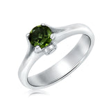 Peridot and diamond ring in 18kt white gold
