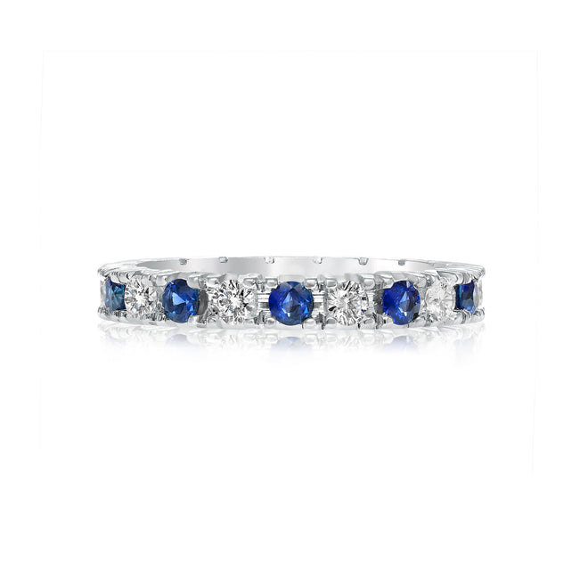 Classic four prong diamond and sapphire wedding band
