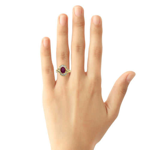 Ruby and diamond ring on hand