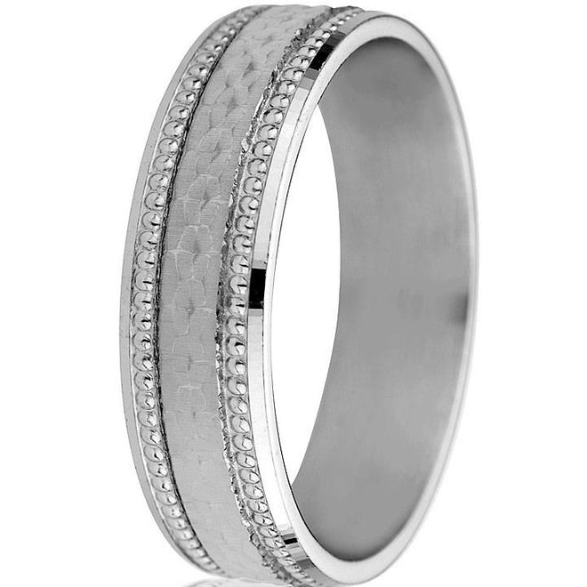 6mm 14K white gold wedding band with hammered centre, milgrain detailing and polished edges.

